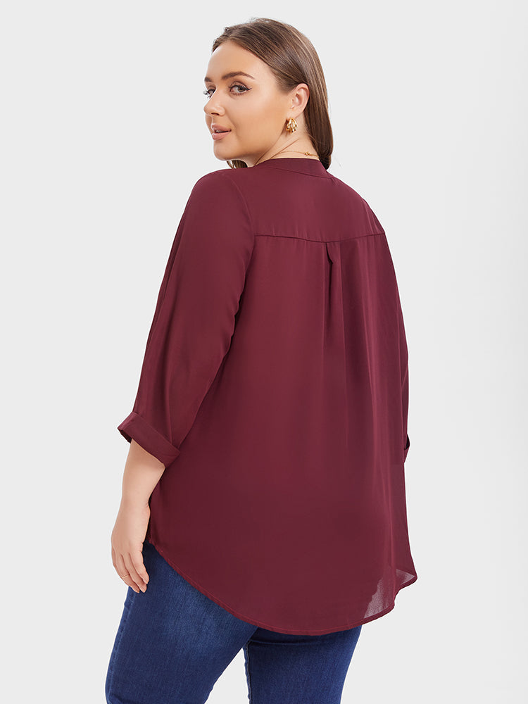 Bluse mit halber Knopfleiste und Ärmelmanschetten